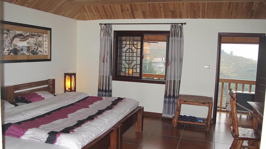 Longji Holiday Hotel Луншэн Номер фото