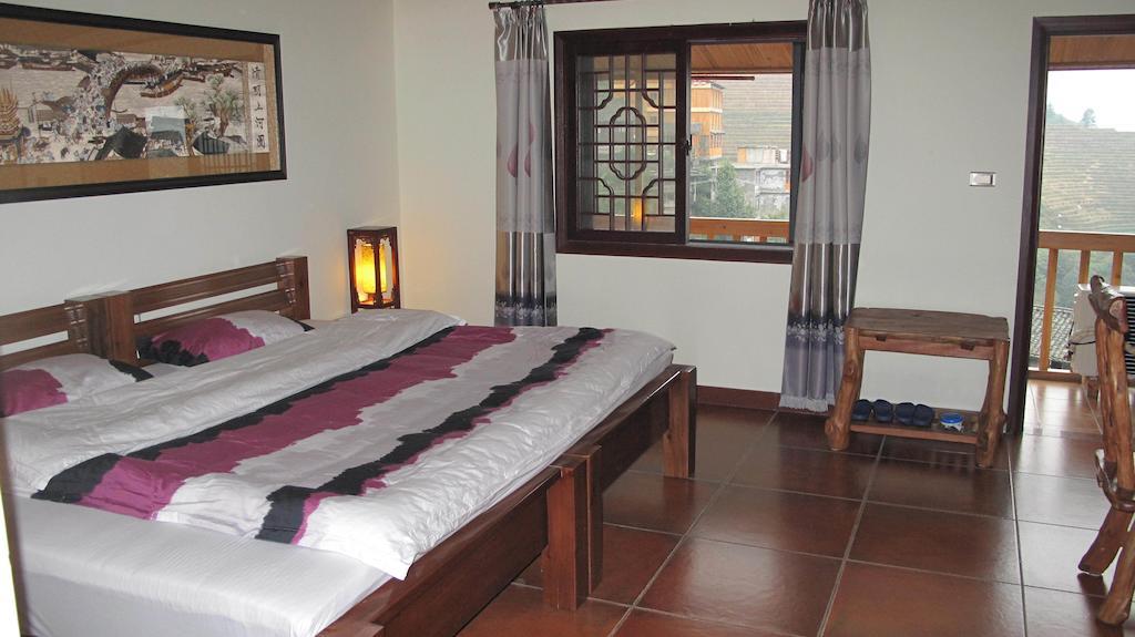 Longji Holiday Hotel Луншэн Номер фото